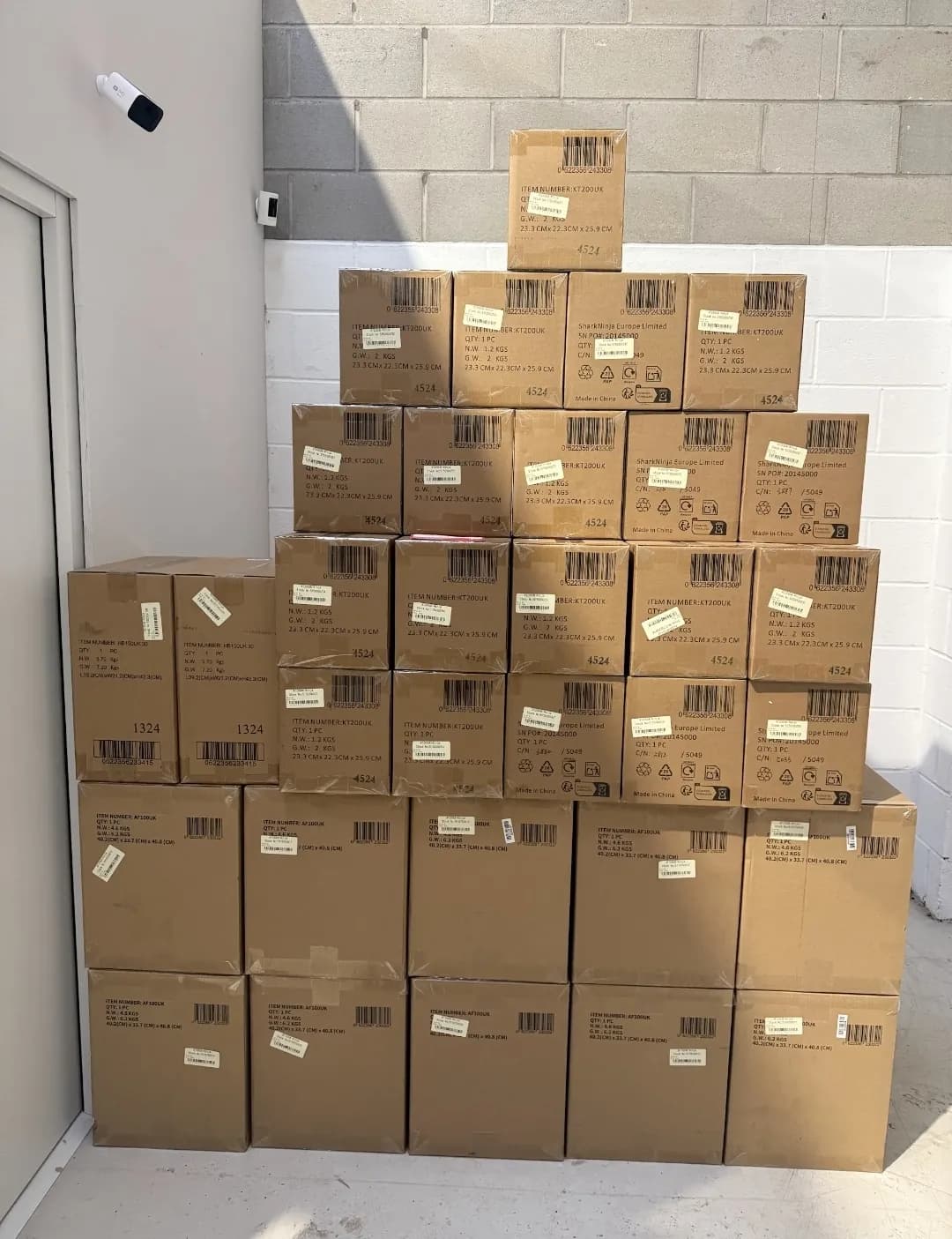 Stack of boxed Ninja appliances ready for dispatch